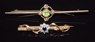 Two 9ct gold brooches, one set with a peridot and the other sapphire and cubic zirconia, 5g