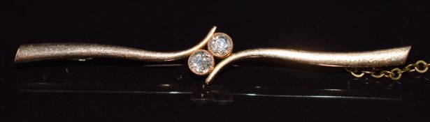 A 15ct gold brooch set with two diamonds, 3.2g, 5.5cm