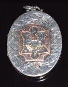 Victorian hallmarked silver locket with applied gold decoration, Birmingham 1884, 4.3 x 3.3cm