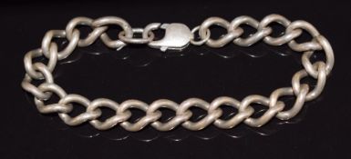 A silver curb link bracelet, 20cm long