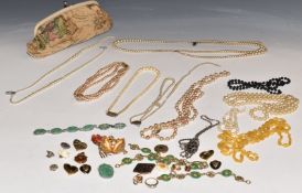 A collection of costume jewellery including Chinese necklace and bracelets, rolled gold locket,