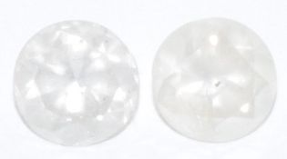 Two loose round cut diamonds, one 0.45ct & 0.4ct