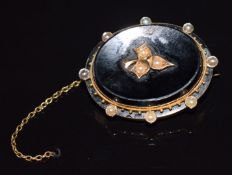 Victorian mourning brooch set with onyx, enamel and pearls, 13.8g, 3.2 x 2.6cm