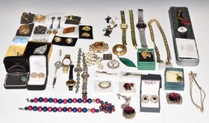 A collection of costume jewellery including a silver David Andersen brooch set with green enamel,
