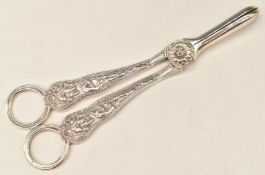 Elizabeth II pair of hallmarked silver grape scissors, with decoration of stag and dogs,