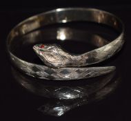 A gold plated on silver snake/ serpent bangle, London 1975, 6cm diameter