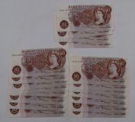 A collection of nineteen clean crisp UK 10 shilling banknotes comprising a consecutive run of
