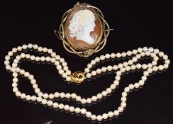 A two strand pearl necklace with 9ct gold clasp impressed JKA (26cm long) and a Victorian