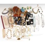 A collection of costume jewellery including silver and other necklaces, diamanté, faux pearls,