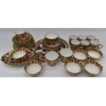 Thirty four pieces of Royal Crown Derby tea and coffee ware, including 23cm plate in 1128 pattern, 6