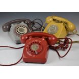 Three retro telephones including red, cream and grey examples and 746F and 706L