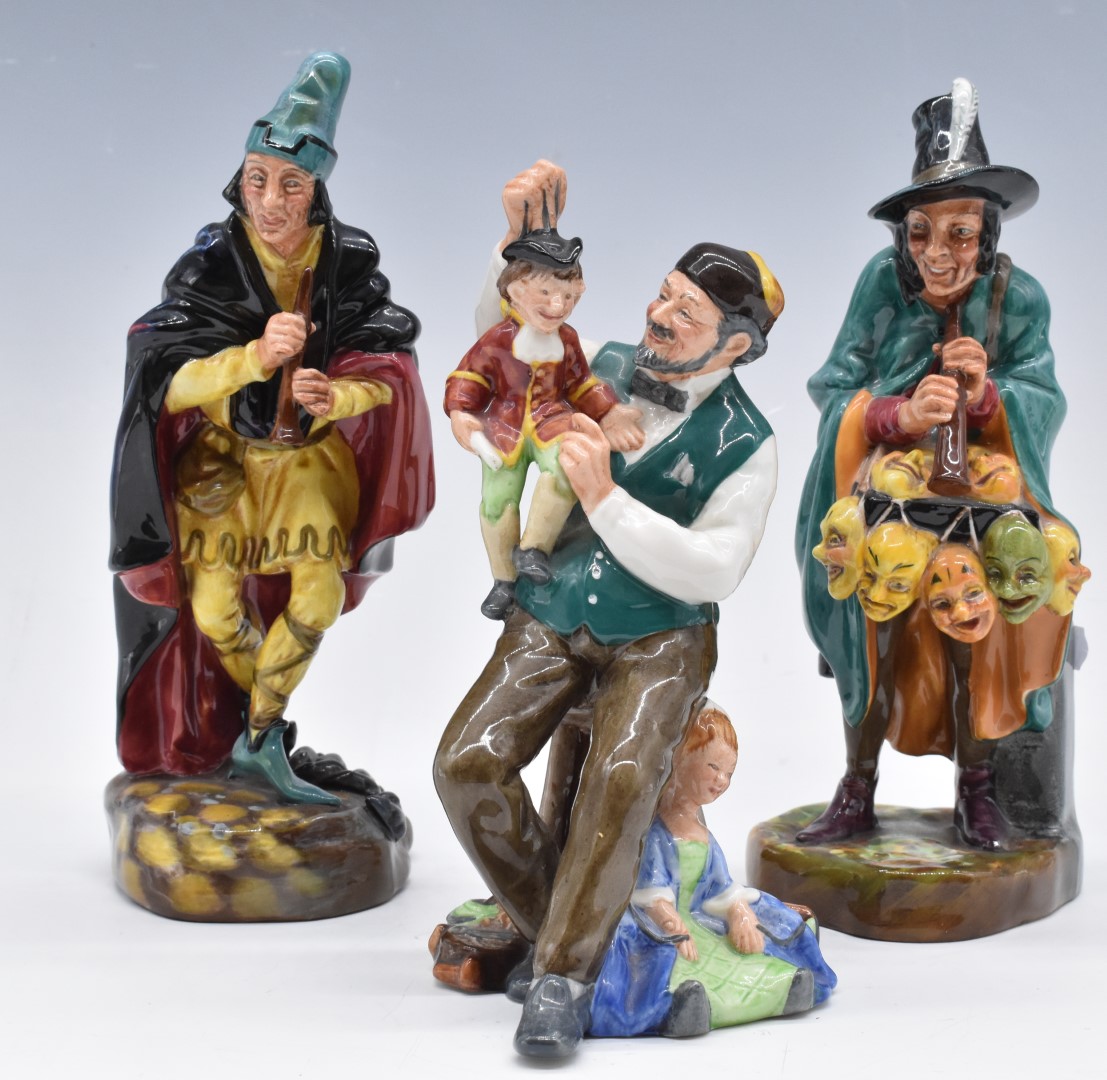 Three Royal Doulton character figures Puppet Maker, Mask Seller and Pied Piper, tallest 24cm