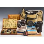Trout fishing equipment, books and accessories to include reels, fly boxes and contents, accessories