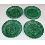 Seven 19thC Wedgwood Majolica Sunflower plates, impressed marks verso, diameter 22cm