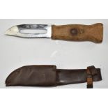 Lightweight cork handle fishing knife with 12cm cut out double edged blade, one edge serrated, by