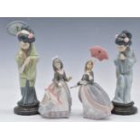 Four Lladro figurines comprising two Japanese ladies and two girls with parasols, tallest 30cm,