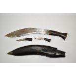 Kukri knife with 29cm blade and leather sheath. PLEASE NOTE ALL BLADED ITEMS ARE SUBJECT TO OVER