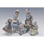 Five Lladro figures including clowns, tallest 25cm