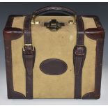 Leather bound canvas shotgun cartridge magazine or case with brass fittings and felt lined interior,