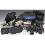 Modern digital and video cameras to include Sony Handycam DCR-DVD301, Canon MV 830, JVC GR-DVL 9600,