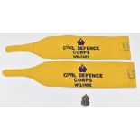 Two Civil Defence arm bands with ink stamp 1954 Lewis Falk Ltd, broad arrow and CD/48 to interior,