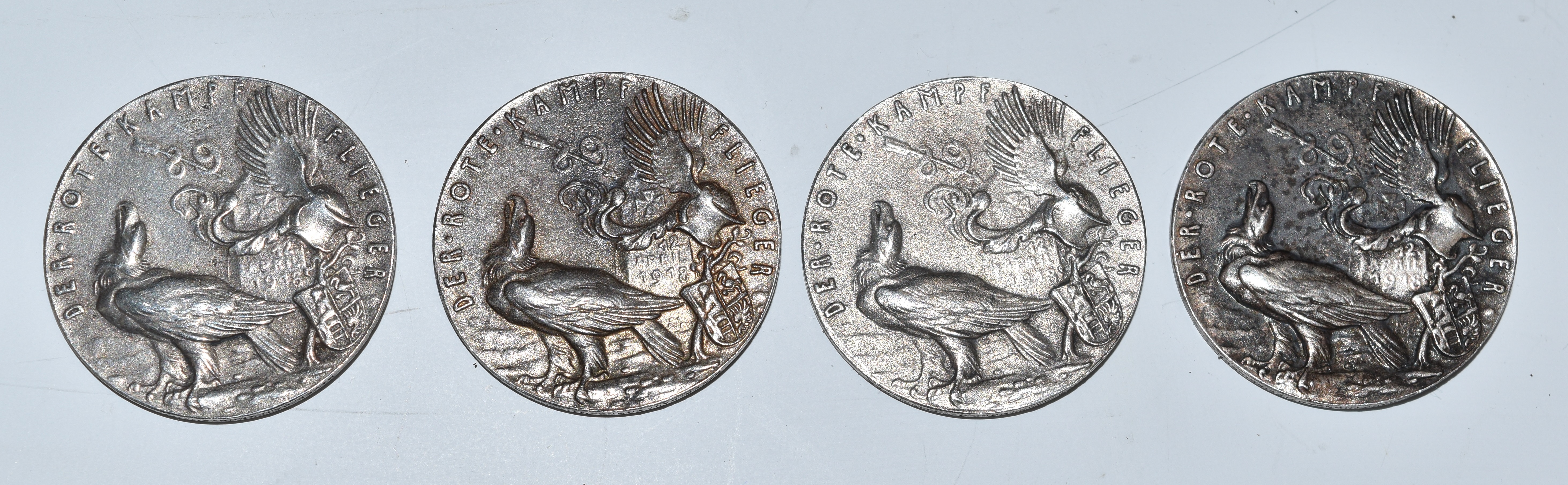 Four German white metal medallions impressed 'Der Rote Kampf Flieger' and Rittmeister Manfred Frhr V - Image 2 of 2