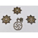 Three reproduction German Nazi Third Reich D.A.P medals/badges together with a wreathed swastika