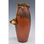 Twin handled pottery vase with indistinct signature to base and incised 390, H37.5cm