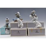 Five Lladro Eskimo / Inuit and polar bear figures, with boxes, tallest 17cm