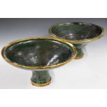 A pair of 18th/19thC Hispano Moresque green glazed pedestal bowls with metal mounts, diameter 44,