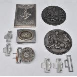 Two reproduction German Nazi Third Reich belt buckles together with clips and plaques