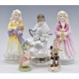 Three Royal Worcester figures, Royal Crown Derby example and a Royal Albert Beatrix Potter figure of