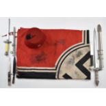 Reproduction items comprising German flag, fez hat and four daggers, longest 57cm