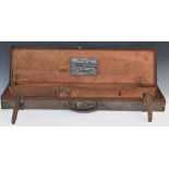 Leather and canvas bound shotgun case with fitted interior and 'Established 1810 Stensby & Co Gun,