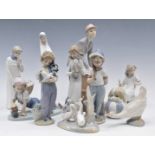 A collection of Lladro, Nao and Cascades figures, tallest 31cm