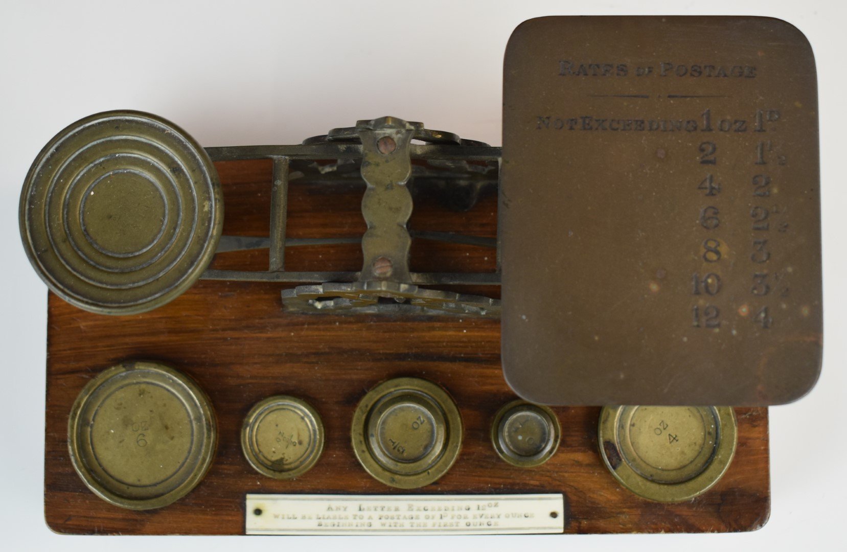Mordan & Co. Victorian brass postage scales, on wooden base with weights and with postage rates to - Image 2 of 5