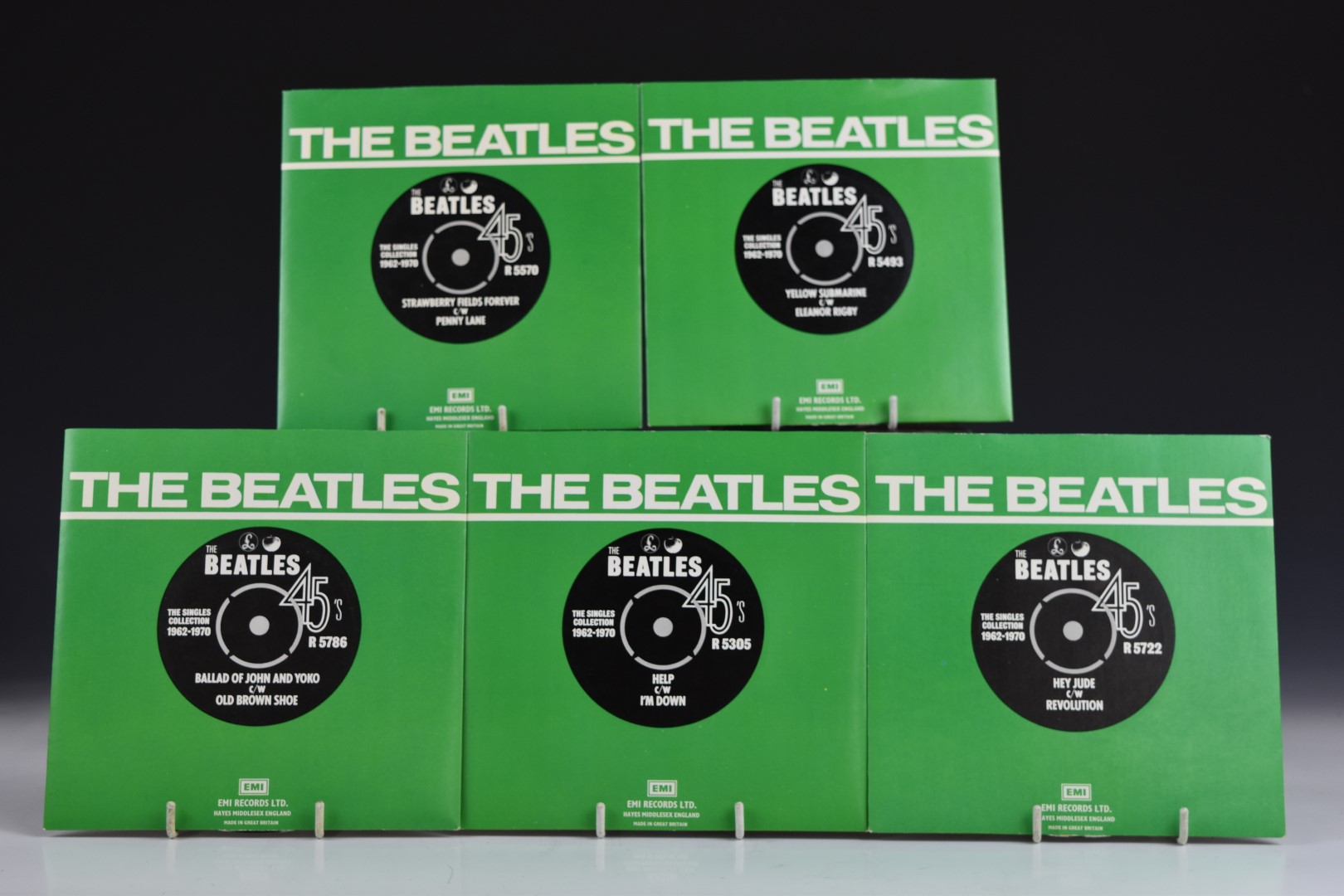 Approximately 50 singles including The Beatles green and white cover reissues