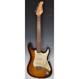 Westfield Stratocaster style electric guitar with Peavey Vypyr amplifier.