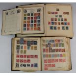 The Strand, Lincoln and Improved stamp albums containing a mint and used GB and World stamp