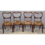 Set of four late Regency / Victorian balloon back dining chairs with serpentine front and sabre back