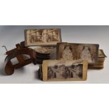 Victorian or early 20thC stereoscopic viewer together with approximately 100 cards, including