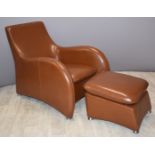 Tan faux leather Art Deco style chair and matching footstool