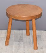 Ercol or similar light elm coffee table, diameter of top 45cm, height 46cm