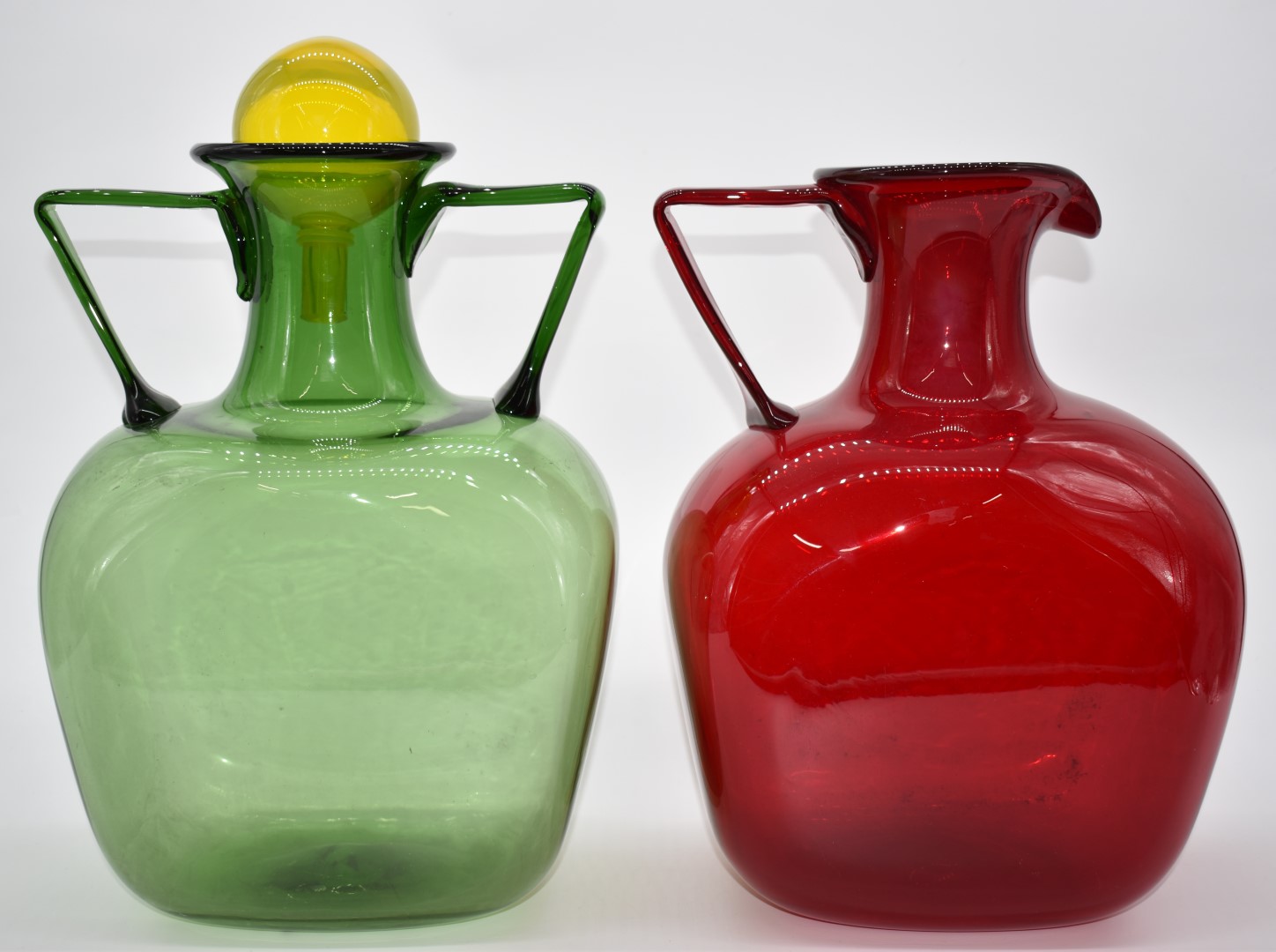 Two Polspotten jugs, one green with twin handles and yellow stopper the other red, tallest 43cm - Image 2 of 2