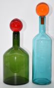 Two Polspotten bubbles and bottles decanters, one green with red stopper the other blue with