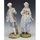 A pair of large Continental porcelain figures of sweethearts, with green anchor mark to base, H43cm