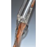 Essex 12 bore side by side shotgun with engraved scenes of dogs to the locks, engraved underside,