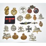 Collection of metal badges including 9th Lancers, Fife and Forfar Yeomanry, Royal Tank Regiment,