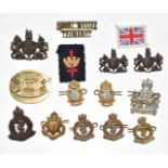 British Army small collection of badges including Royal Artillery Medical Corps economy and collar