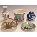 Five pieces of Chinese ceramics to include a hexagonal jardinière and stand, prunus ginger jar,